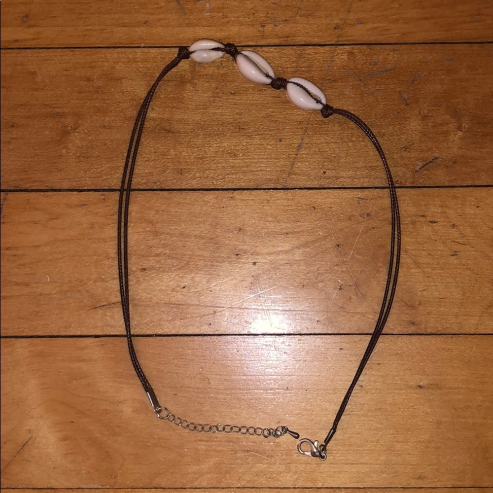 good condition, three shell, puka shell chocker